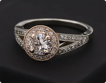 Diamond halo stamped engagement ring