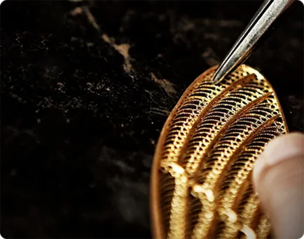 Fine gold filigree stamping work