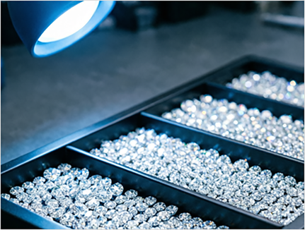 Lab-grown diamond melee parcels sorted by size