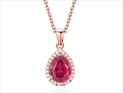 Ruby teardrop halo pendant